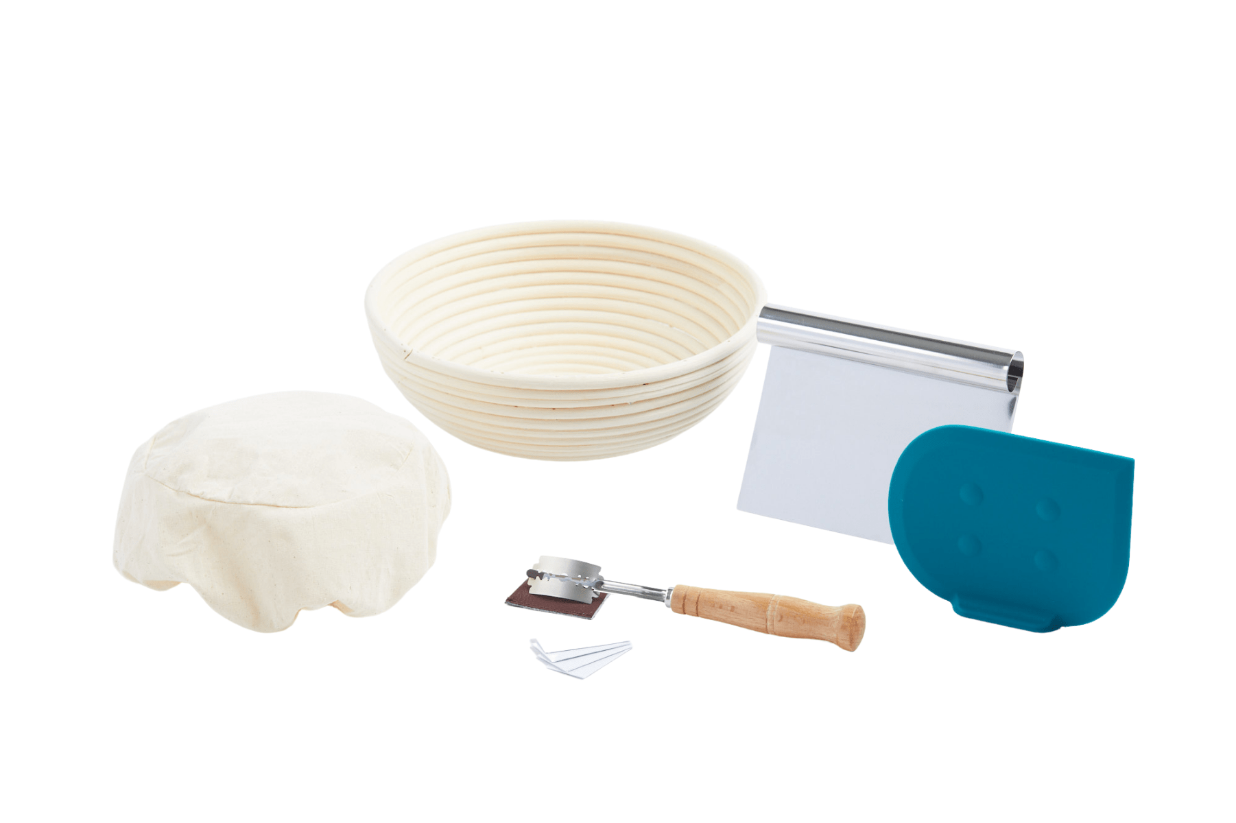 round banneton with liner, bread lame, bench scraper and dough scraper