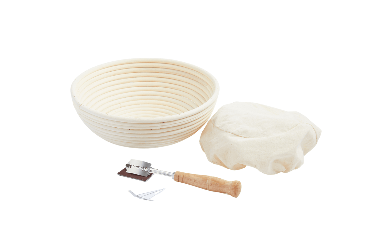 round banneton basket with liner and bread lame